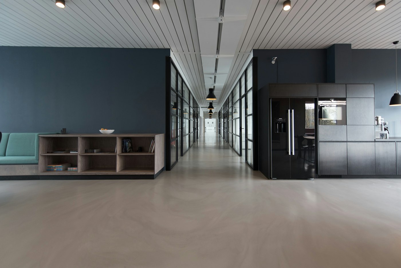 Stock inspiration: a light-filled office with wooden desks and seating